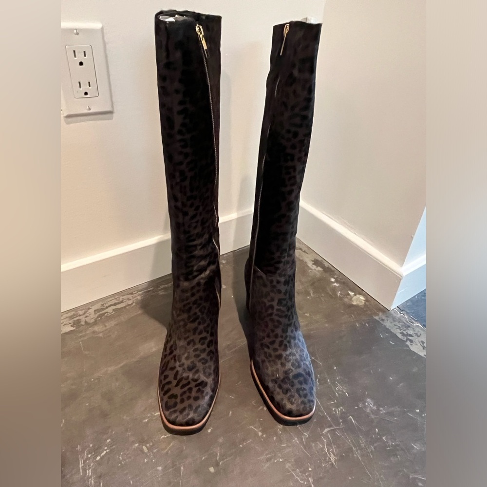 UK Brand- never fully dressed.  Knee high boots.  UK SIZE 8/41.  US SIZE 10.